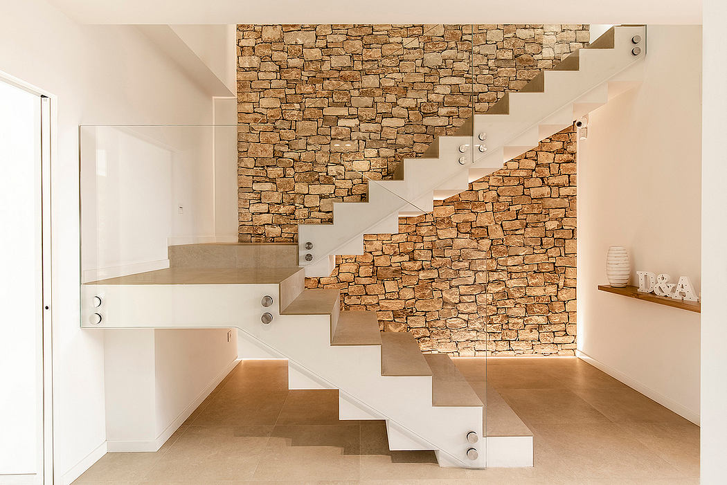 A modern staircase made of stone and wood, creating a striking architectural feature.