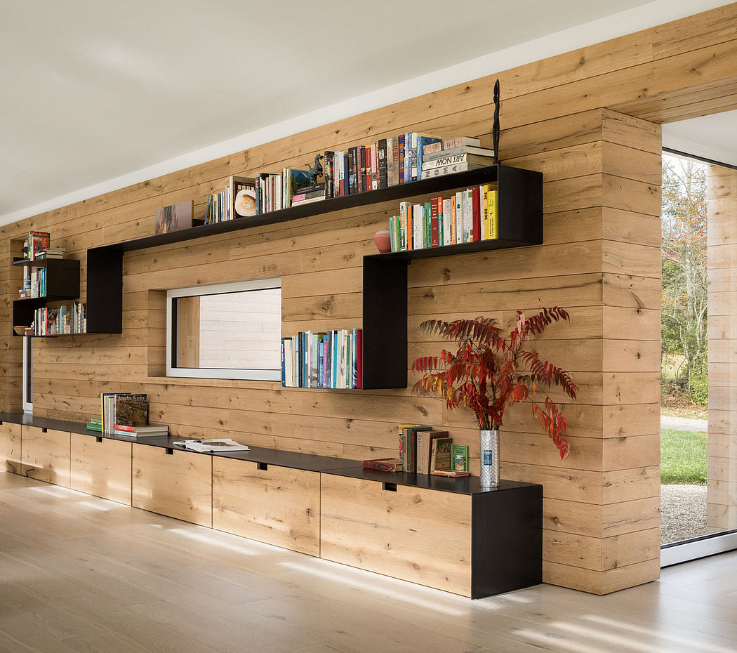 Rustic wooden wall paneling, floating shelves, and built-in cabinetry with a stylish, modern aesthetic.