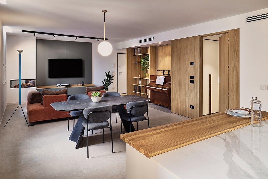 Sleek, modern interior with neutral tones, wood accents, and a minimalist furniture layout.