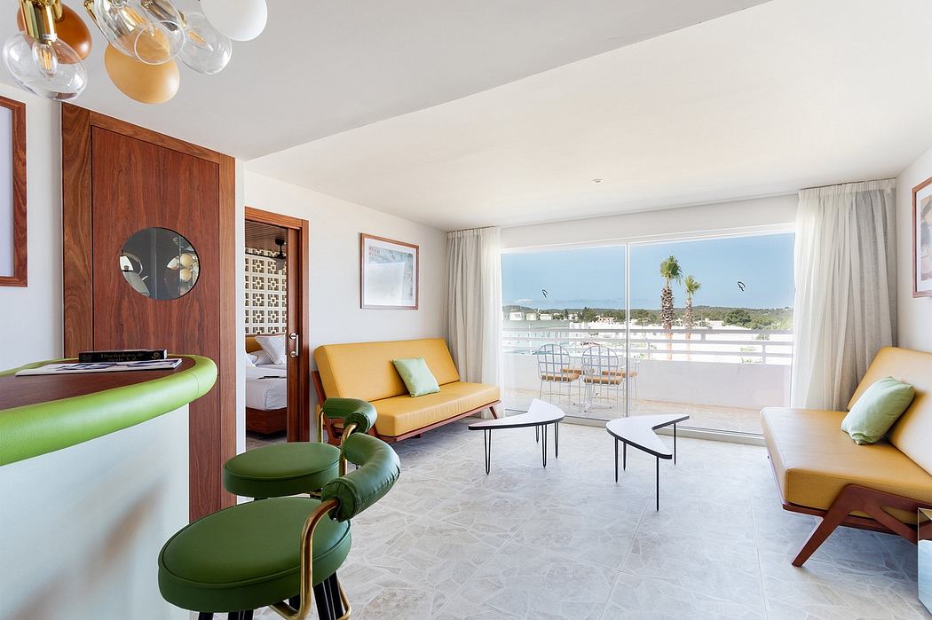 Spacious, modern room with warm wood accents, colorful furnishings, and panoramic views.