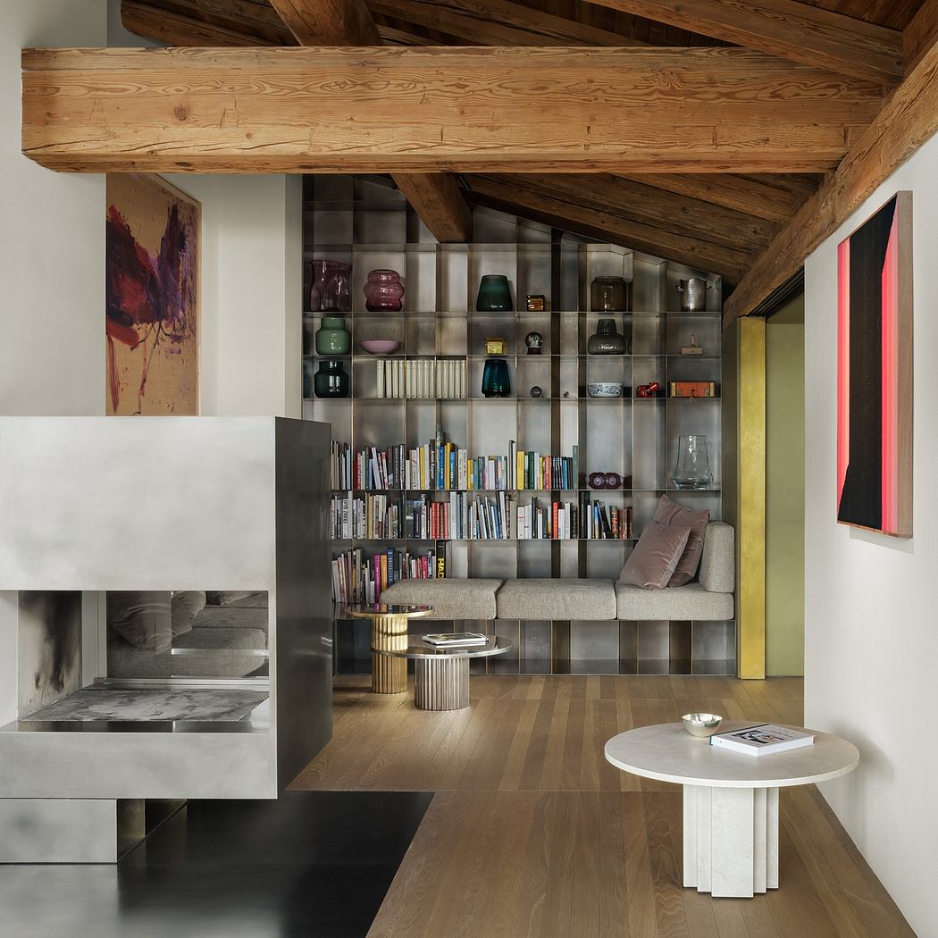 Rustic wooden beams contrast with modern built-in shelving and minimalist decor.