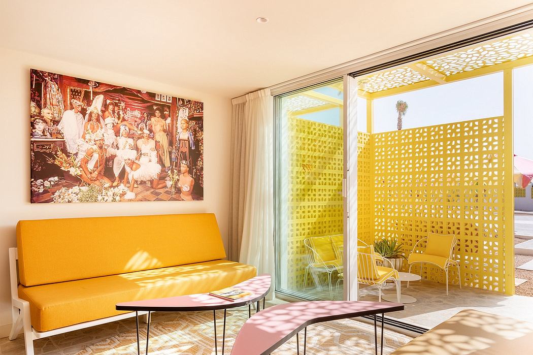 A vibrant, modern interior with a large mural, colorful furnishings, and a patterned screen.