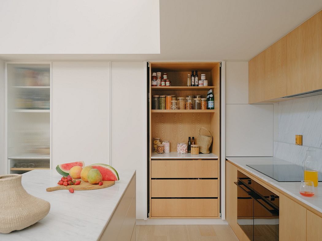 Modern kitchen with built-in storage cabinets, open shelves, and natural wood accents.