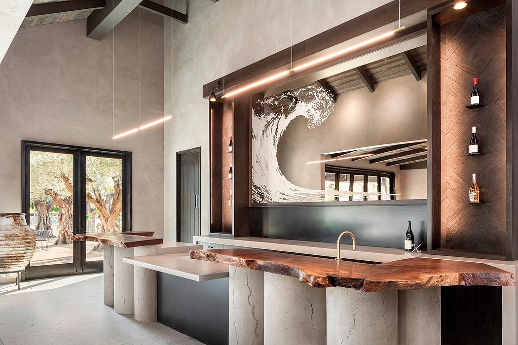 Modern kitchen with rustic wood countertops, marble island, and large wave mural.