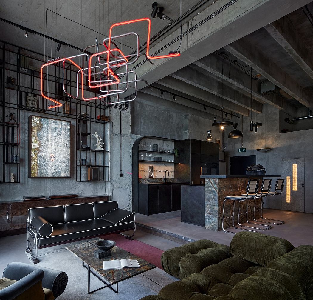 A modern, industrial-style living space with bold neon lighting, concrete walls, and eclectic furnishings.