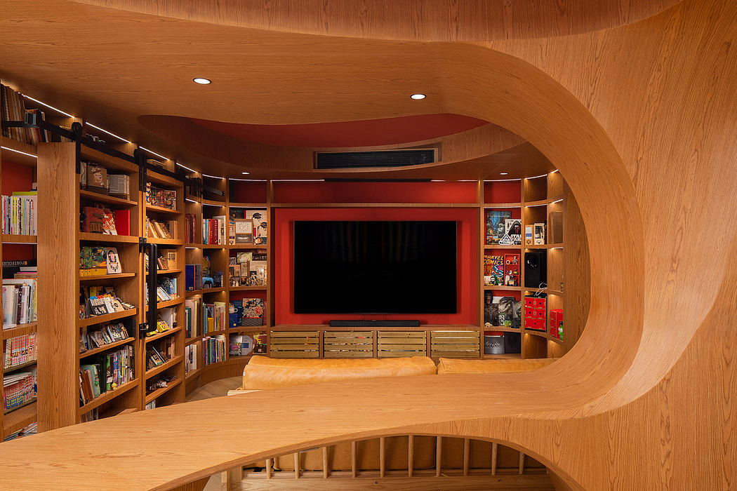 A cozy, custom-built home entertainment space with curved wood shelving and a central TV display.