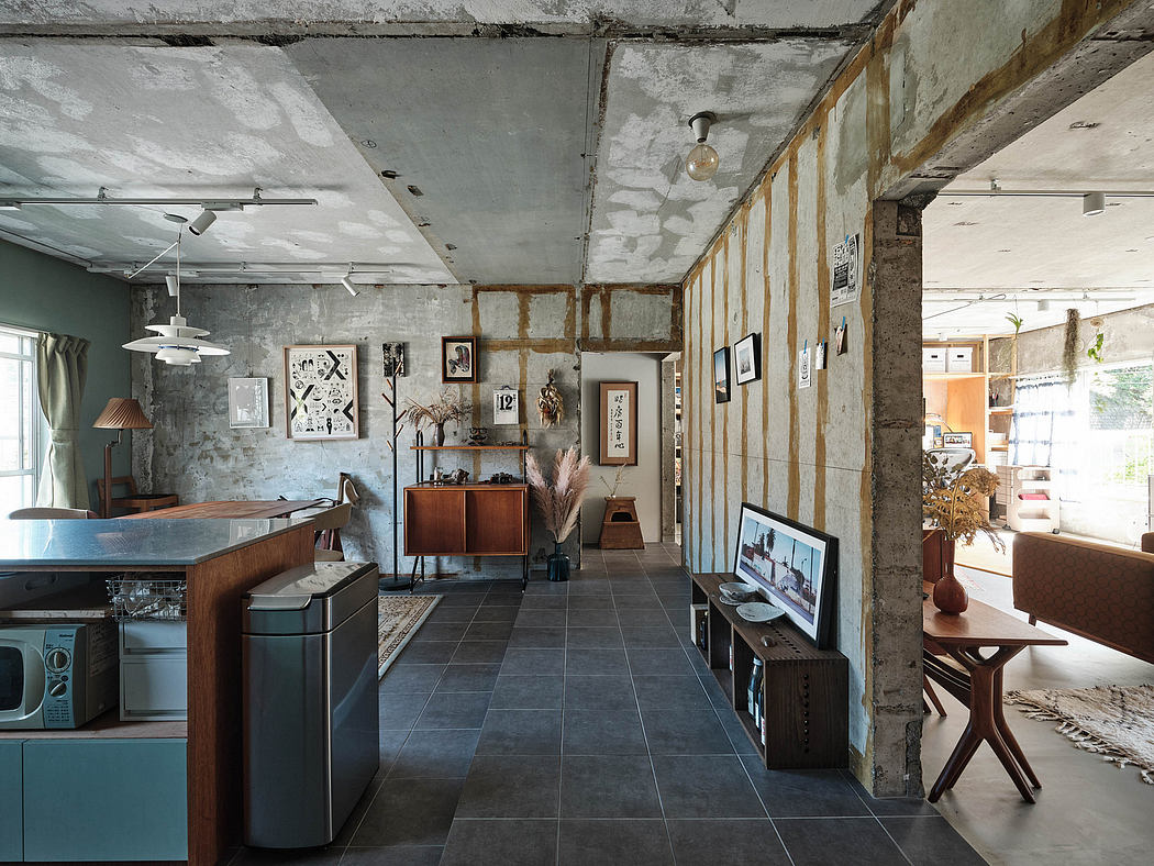 Exposed concrete walls, vintage furnishings, and industrial-style lighting create a cozy, eclectic ambiance.