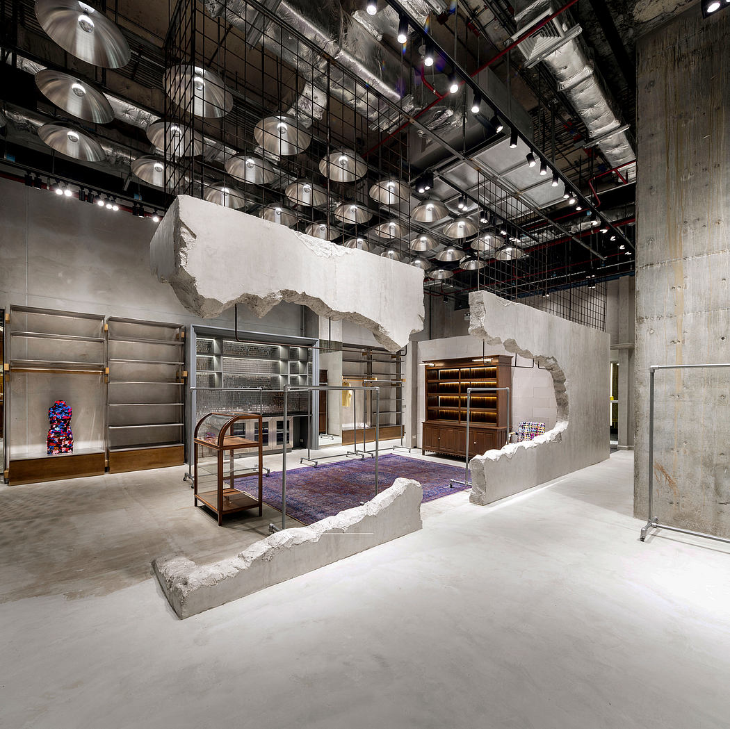 A modern industrial-style interior with concrete walls, metal shelving, and colorful lighting fixtures.