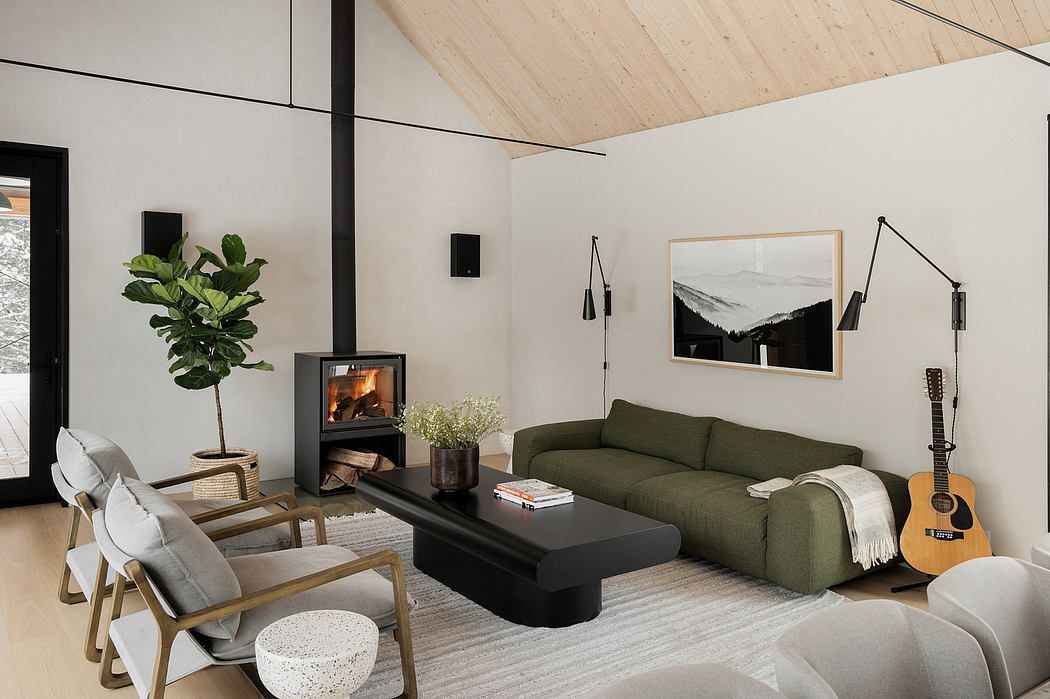 Modern living room with wood-paneled ceiling, cozy fireplace, and minimalist furniture.
