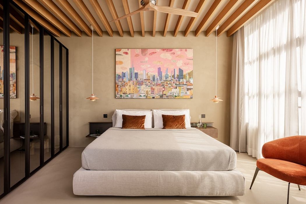 Warm, modern bedroom with wooden beams, city skyline artwork, and sleek furnishings.