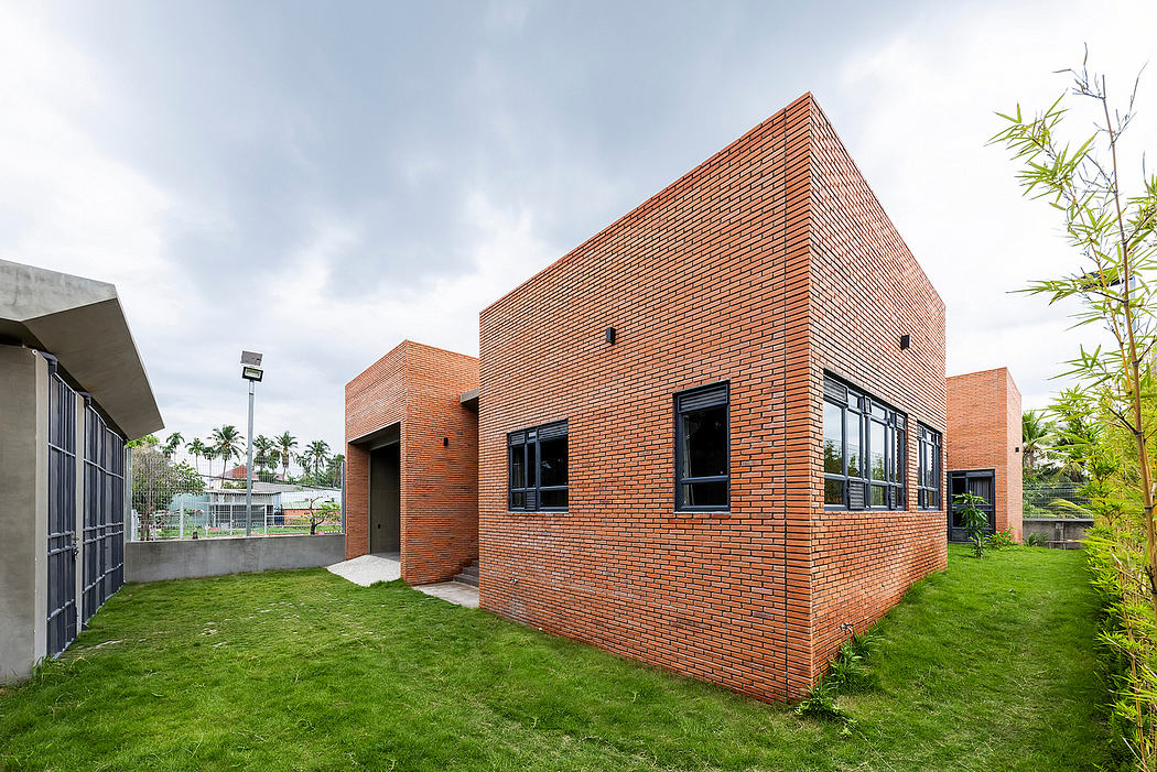 Striking brick exterior with clean lines and contrast between solid and open spaces.