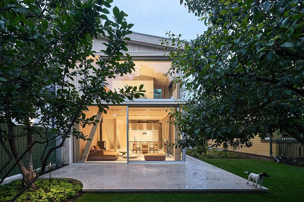 Sleek, modern exterior with large glass windows blending indoor and outdoor spaces.