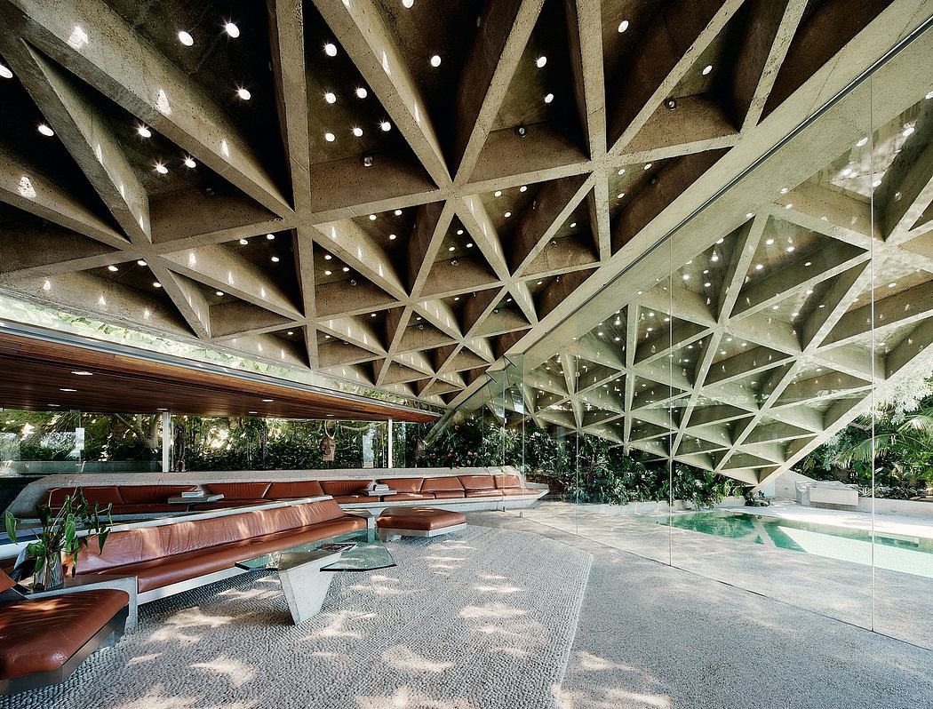 Stunning geometric ceiling with triangular patterns creating a modern, airy atmosphere.