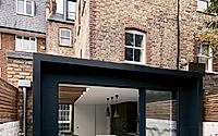 012-the-finned-extension-reconfigures-london-home-for-family-living.jpg