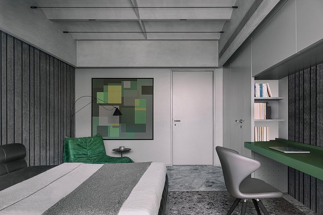 Minimalist bedroom design with concrete ceiling, built-in desk, and abstract artwork.
