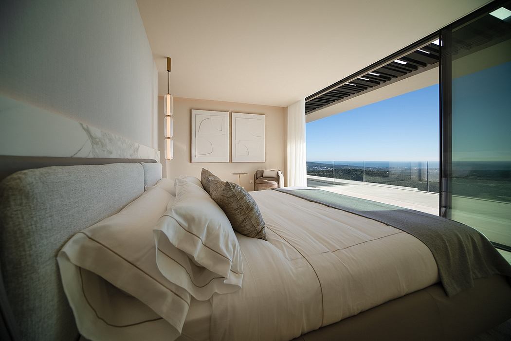 Spacious bedroom with floor-to-ceiling windows offering panoramic views and minimalist decor.