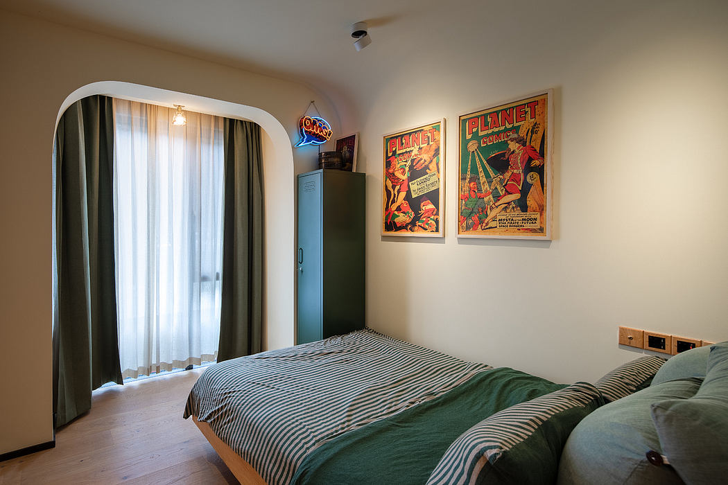 Cozy bedroom with retro-style posters, wooden furniture, and large windows providing natural light.