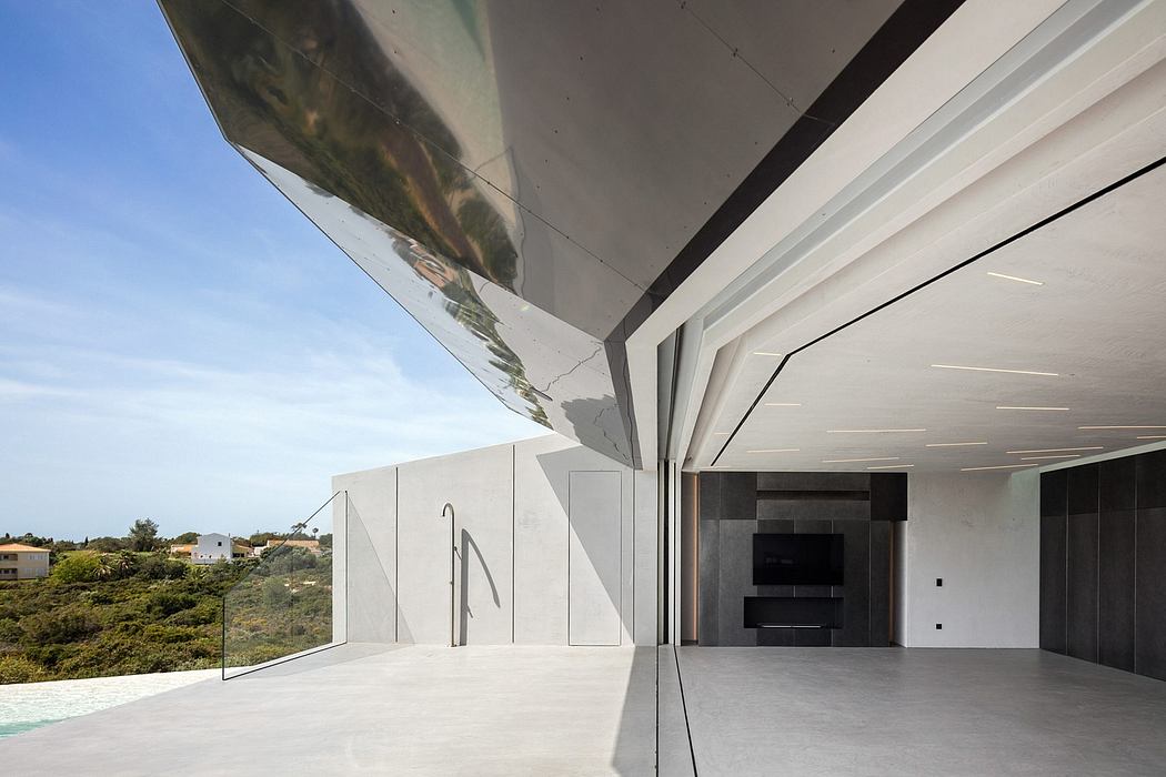 Minimalist, modern architecture with sleek lines, large windows, and a spacious interior.