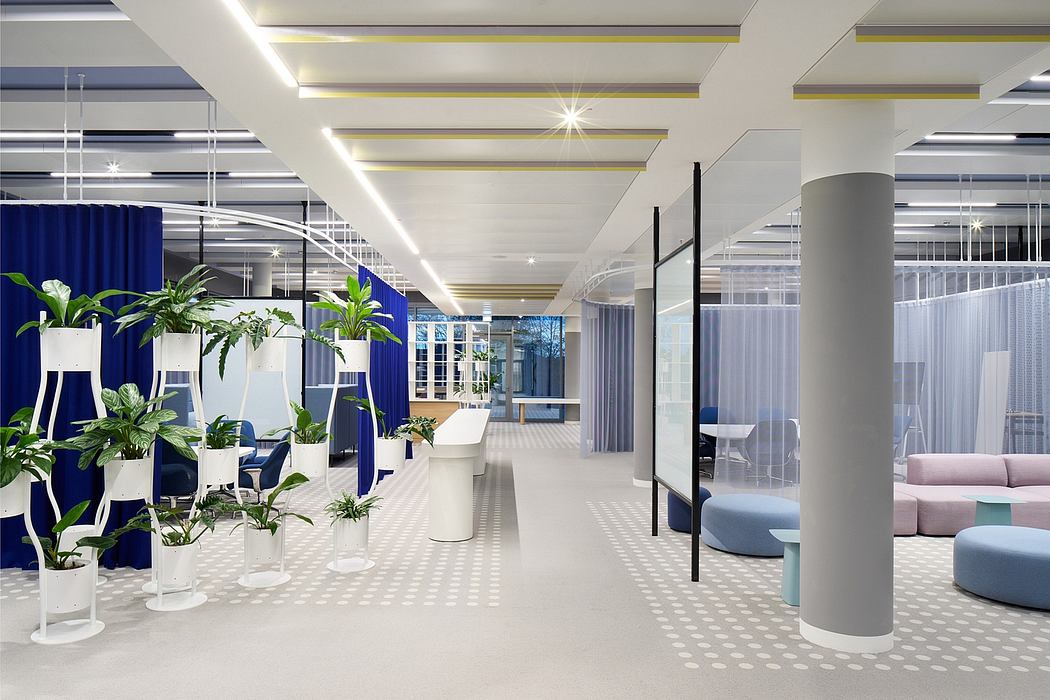Vibrant, modern office space with sleek furniture, greenery, and geometric lighting.
