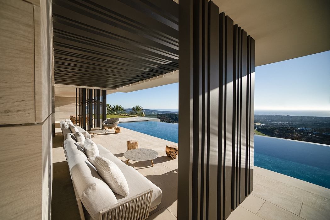Sleek, modern architecture with an expansive outdoor living space and infinity pool.