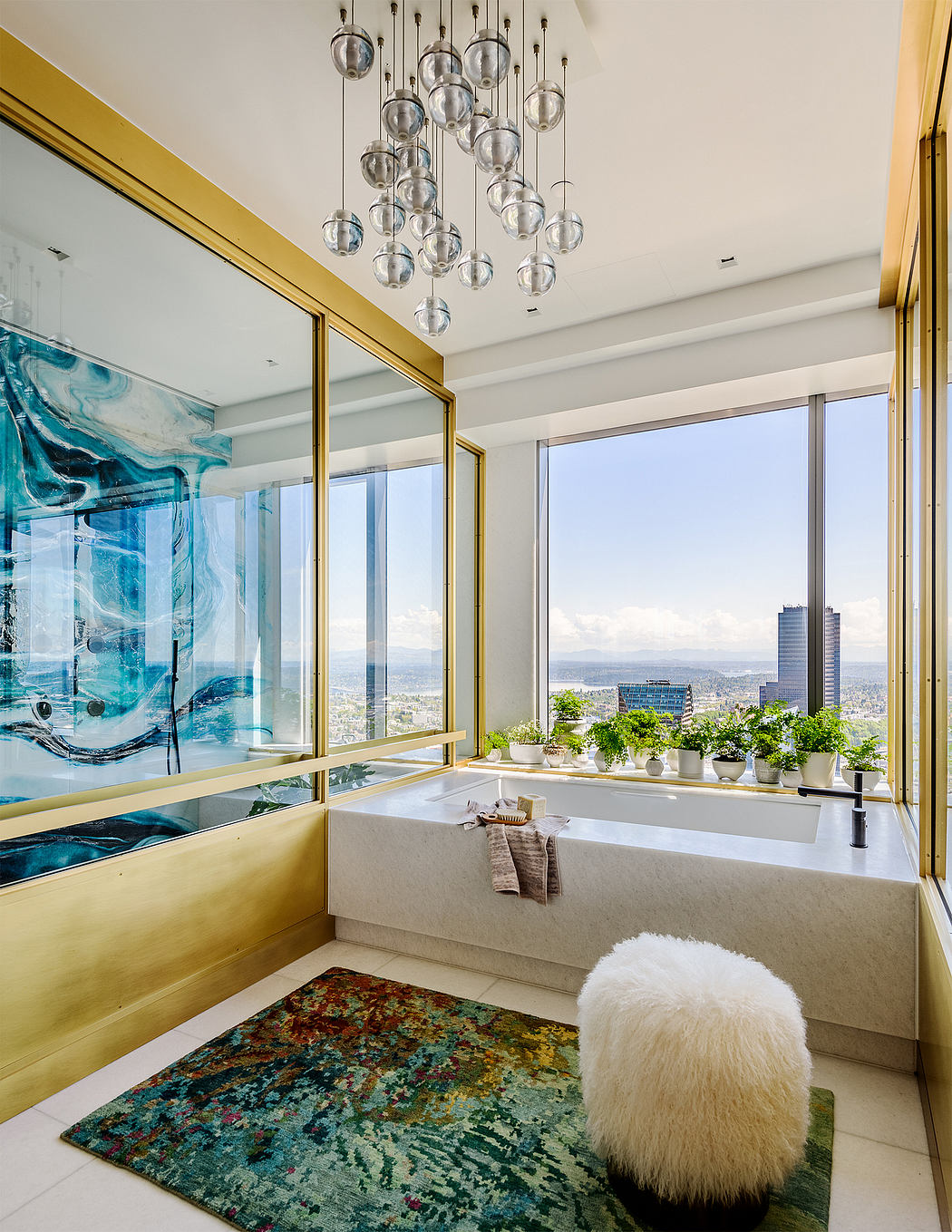 Opulent bathroom with modern chandelier, panoramic city view, and vibrant abstract art.