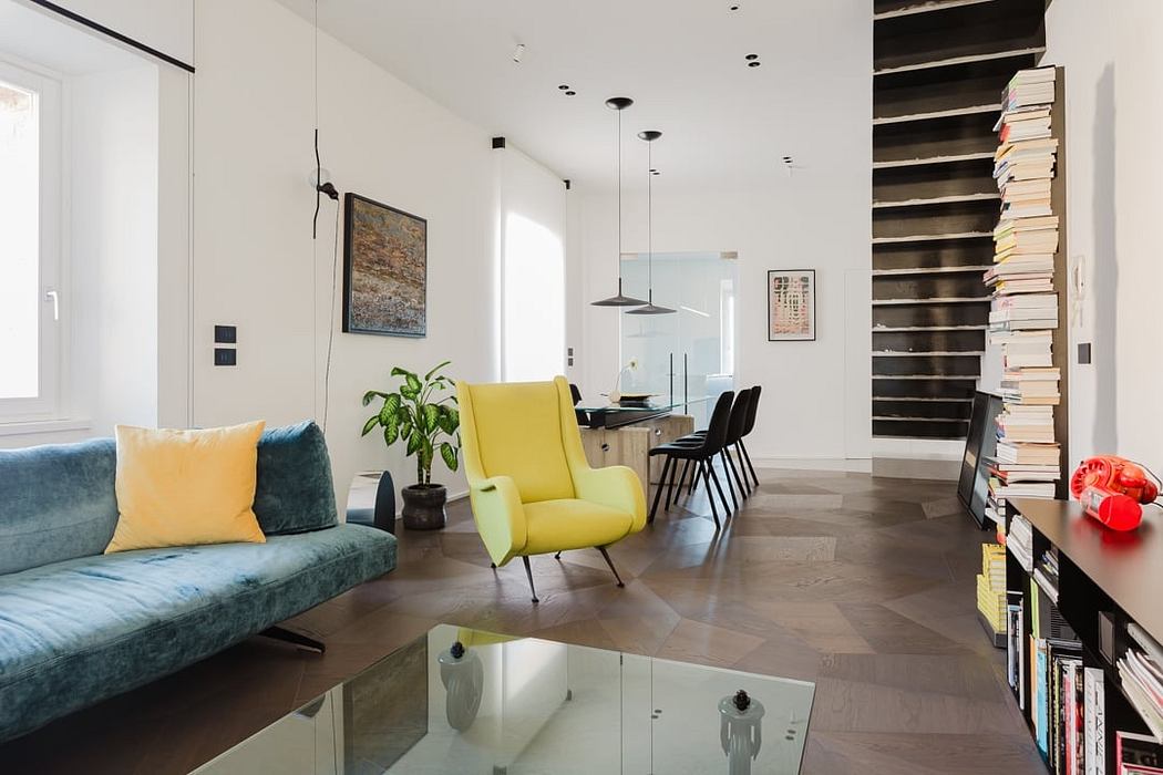 Bright, contemporary interior with sleek furnishings and textured flooring. Cozy seating, modern lighting, and stylish accents.