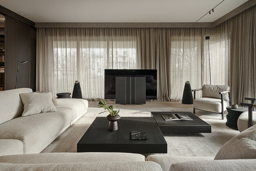 A modern, minimalist living room with neutral tones, textured fabrics, and sleek furniture.