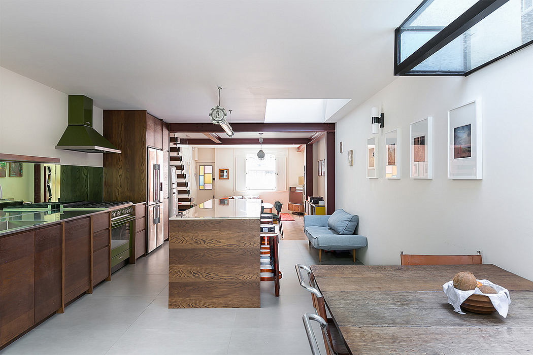 Spacious open-concept kitchen and living area with modern furnishings and wooden accents.