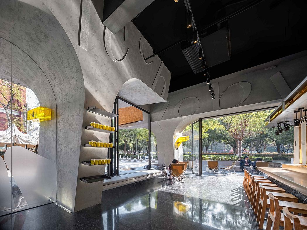 Striking concrete arches, shelving, and glass walls create a bold, modern interior.