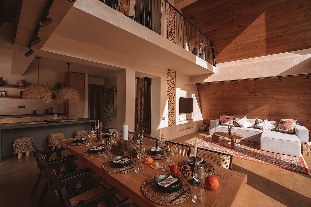 A cozy, rustic interior with wooden beams, plush seating, and a dining area with a laid-back ambiance.