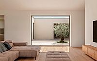 003-house-g-conceals-spacious-atrium-for-privacy-in-slovenia.jpg