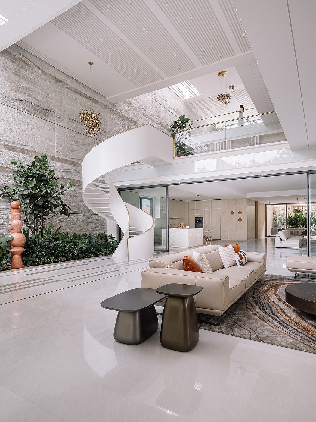 Sleek, modern living space with spiral staircase, lush greenery, and textured stone walls.
