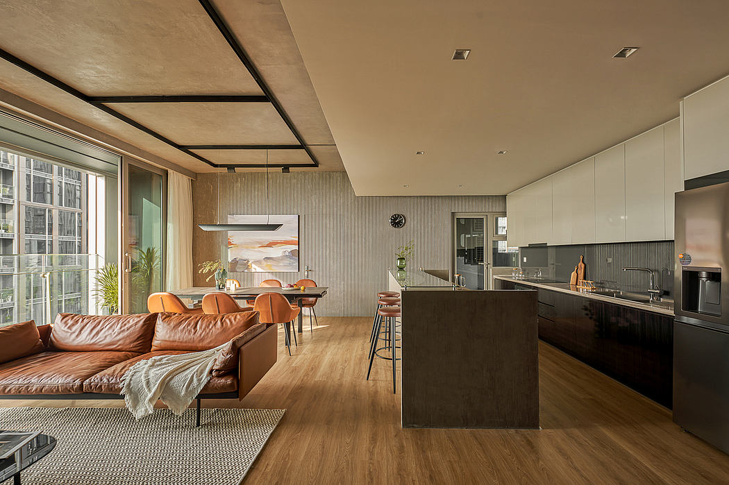 A spacious, open-concept living area with modern furnishings, wooden accents, and a sleek kitchen.