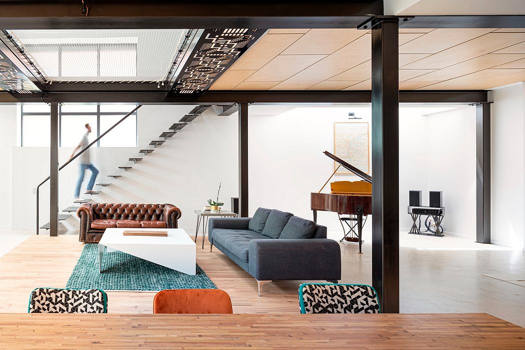 Spacious, modern industrial-style interior with distinct architectural features.