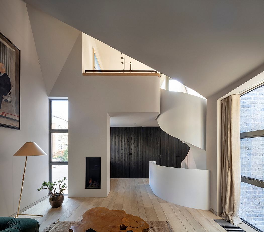 Spacious modern living room with high ceilings, exposed beams, and a stone fireplace.