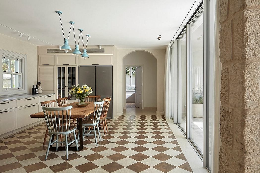 Rustic kitchen with checkered tile floor, wooden furniture, and modern lighting fixtures.