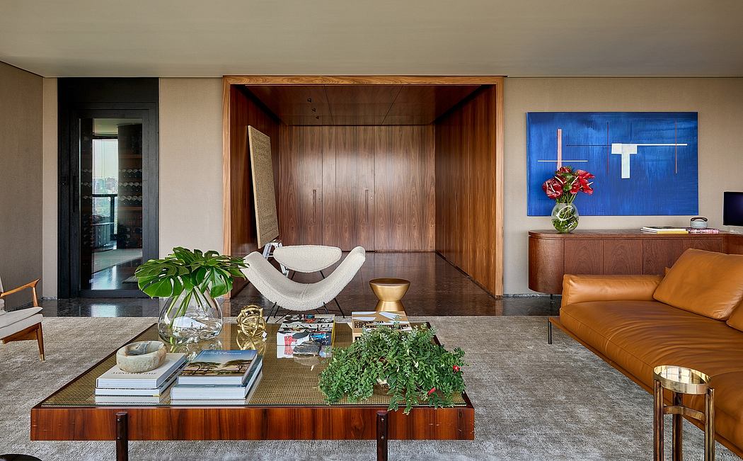 Spacious modern living room with wood-paneled walls, minimalist furniture, and vibrant artwork.