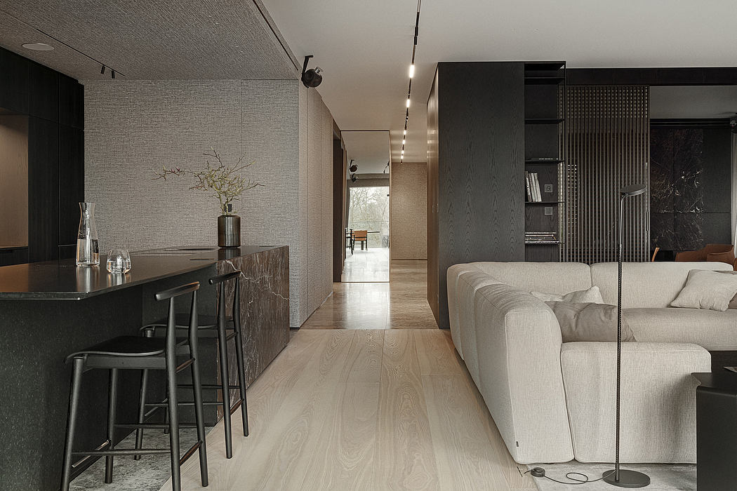 Minimalist living space featuring sleek, modern furnishings and a long, open hallway.
