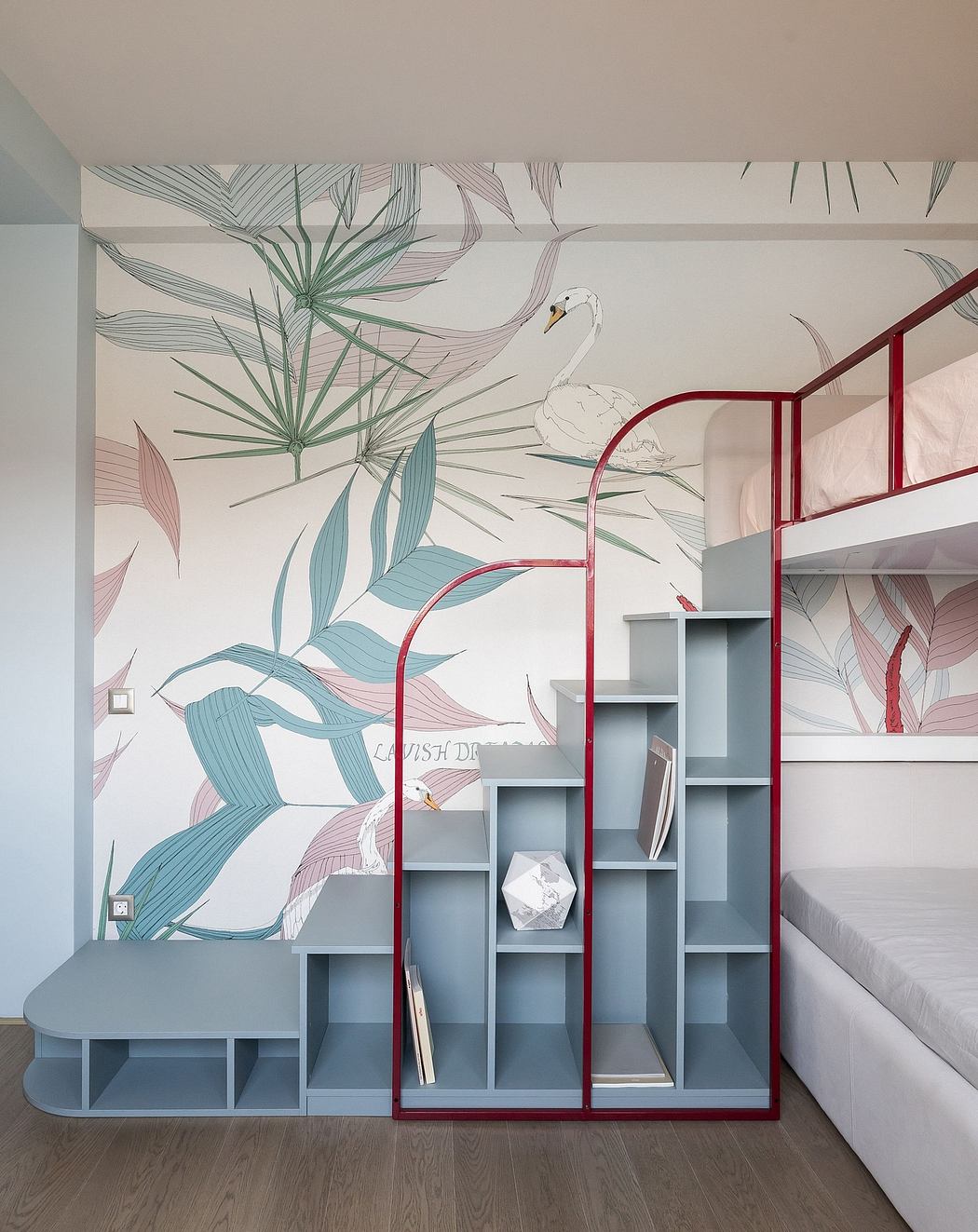 A vibrant tropical-themed mural adorns the wall, complemented by a modular shelving unit with geometric shapes.