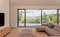 004-house-g-conceals-spacious-atrium-for-privacy-in-slovenia.jpg