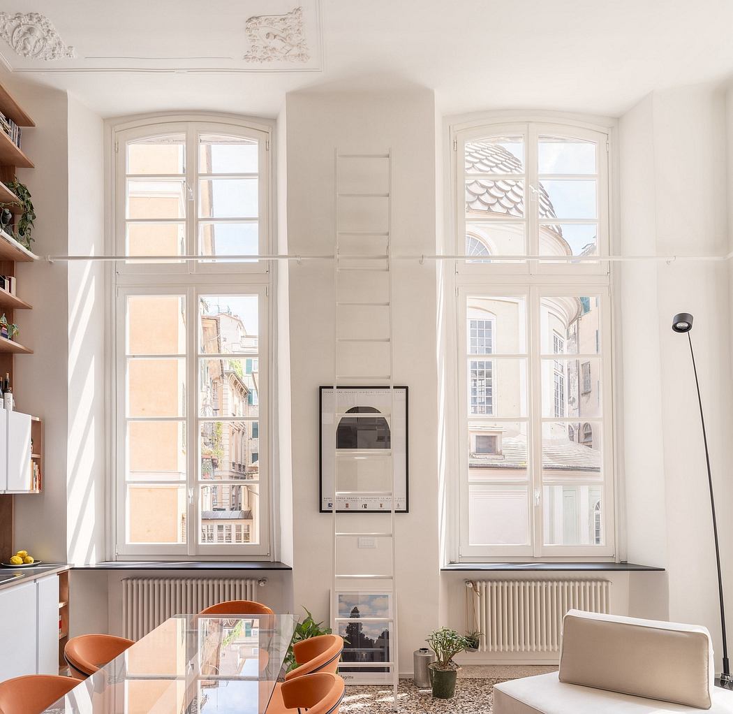 Elegant interior featuring arched windows, built-in shelves, and warm lighting.