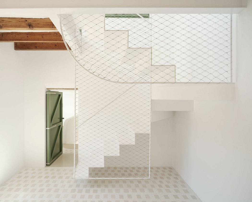 Minimalist architecture with geometric patterns, wooden details, and a white staircase.