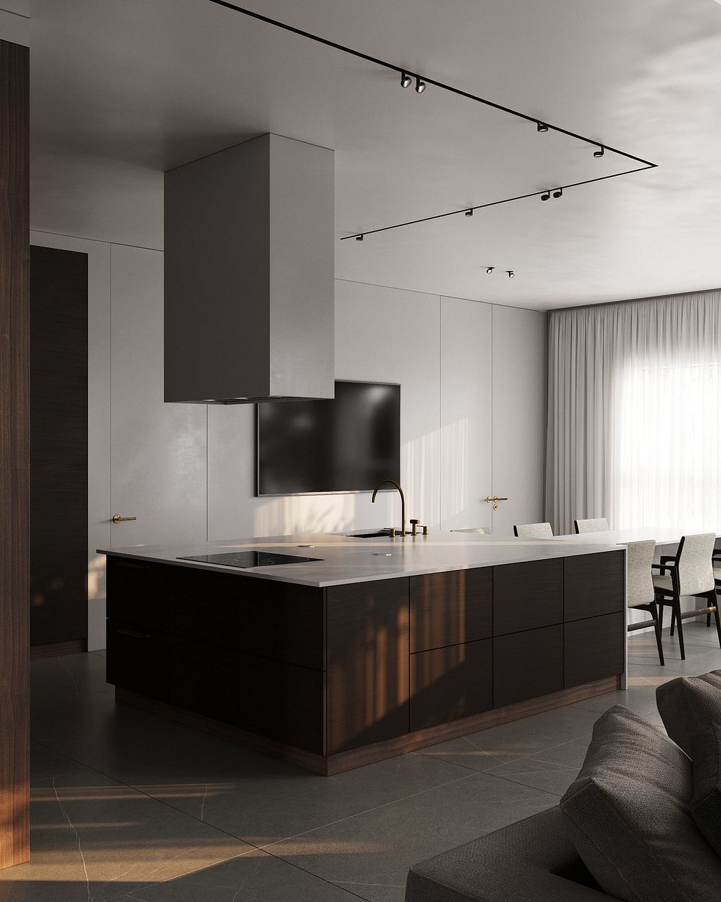 Sleek, modern kitchen with dark cabinetry, island, and track lighting creating a sophisticated ambiance.