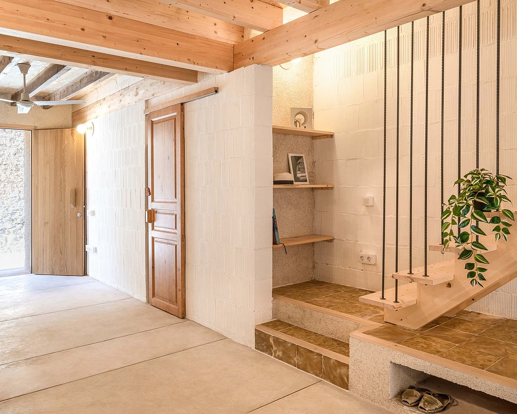 Spacious wooden interior with tiled steps, shelving, and a potted plant. Warm, rustic ambiance.