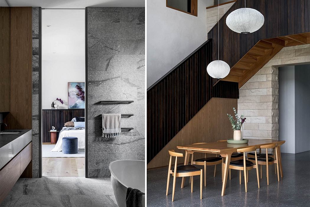 A modern, minimalist interior with wooden furniture, stone walls, and pendant lighting.