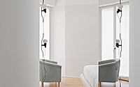 008-apartment-in-via-pozzi-transforms-milan-home-into-warm-bright-space.jpg