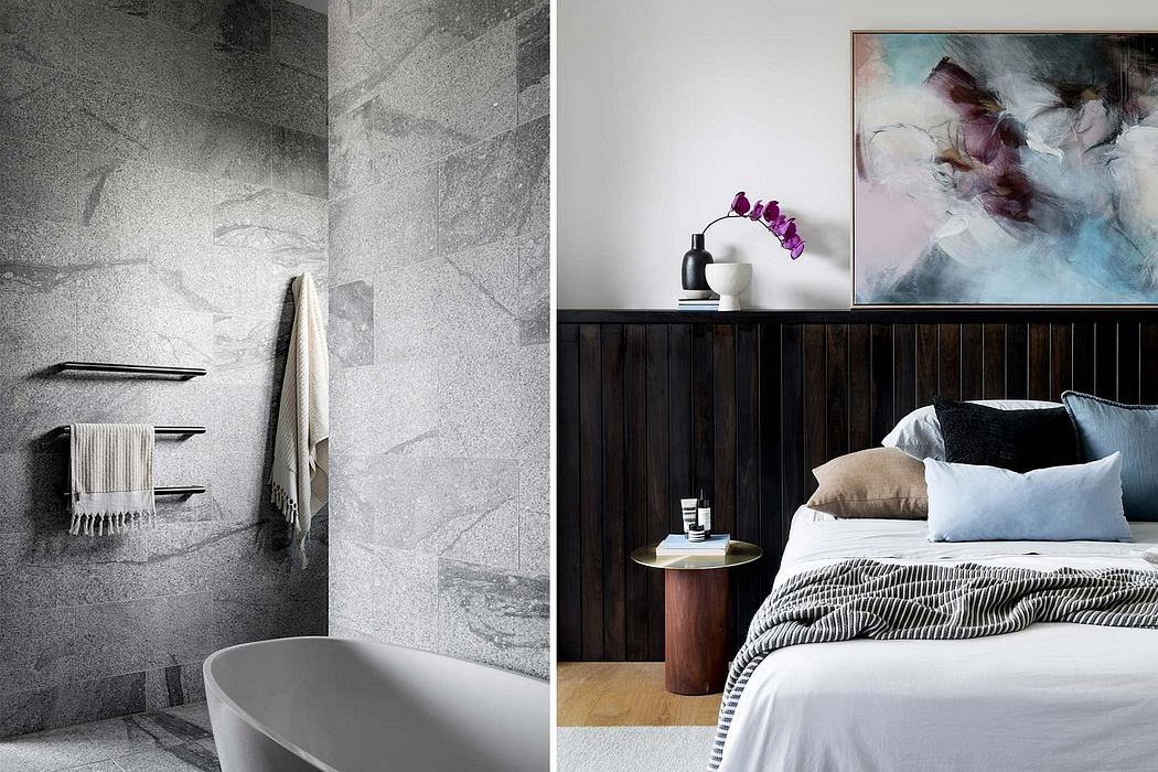 Sleek bathroom with elegant marble accents; Cozy bedroom with moody artwork and wooden paneling.
