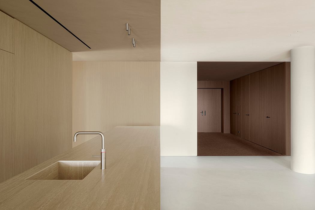 Minimalist interior design with clean lines, natural materials, and recessed lighting.