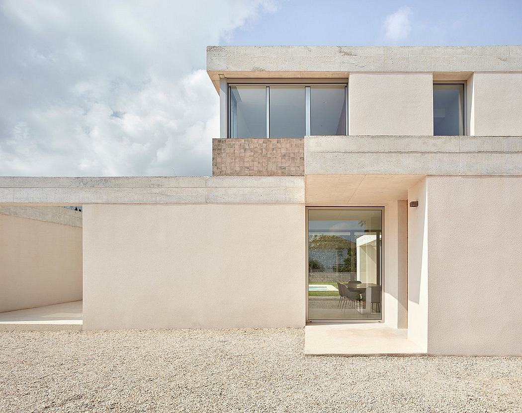 A modern concrete and glass building with clean architectural lines and minimal design.