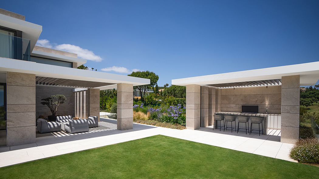 Striking modern architecture with covered outdoor living spaces and landscaping.